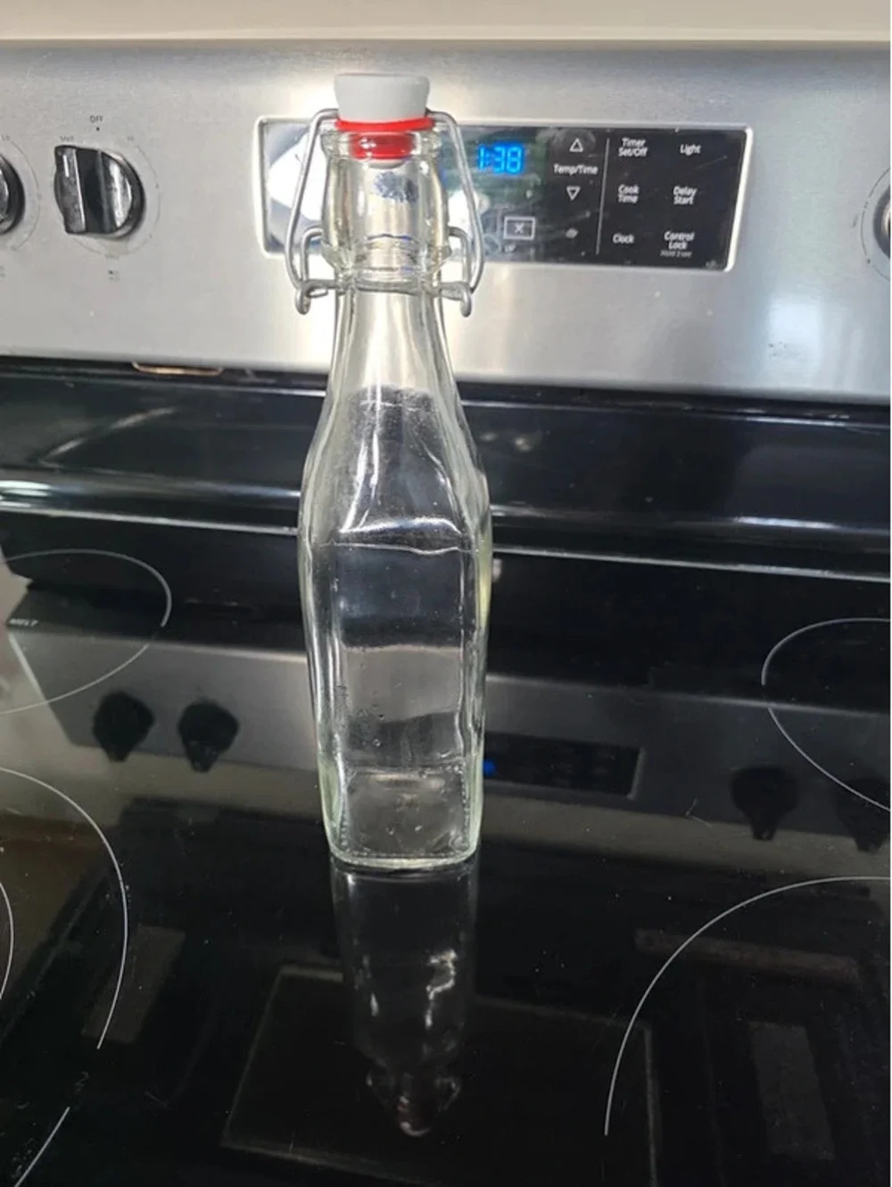 Clear Glass Bottle with Swing-Top Cap